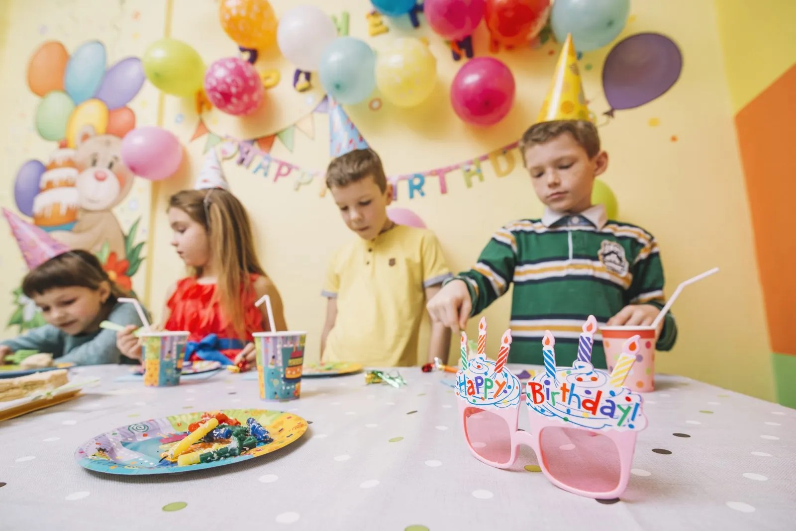 Four children in an inflatable castle. 
