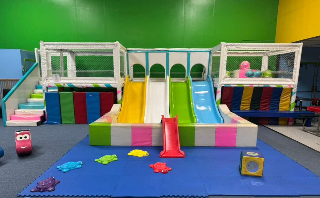 Four children in an inflatable castle. 