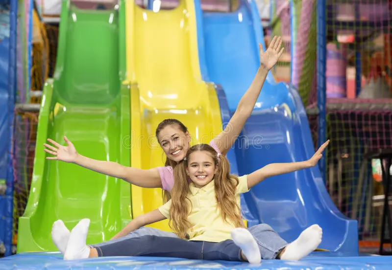 Four children in an inflatable castle. Four children in an inflatable castle.