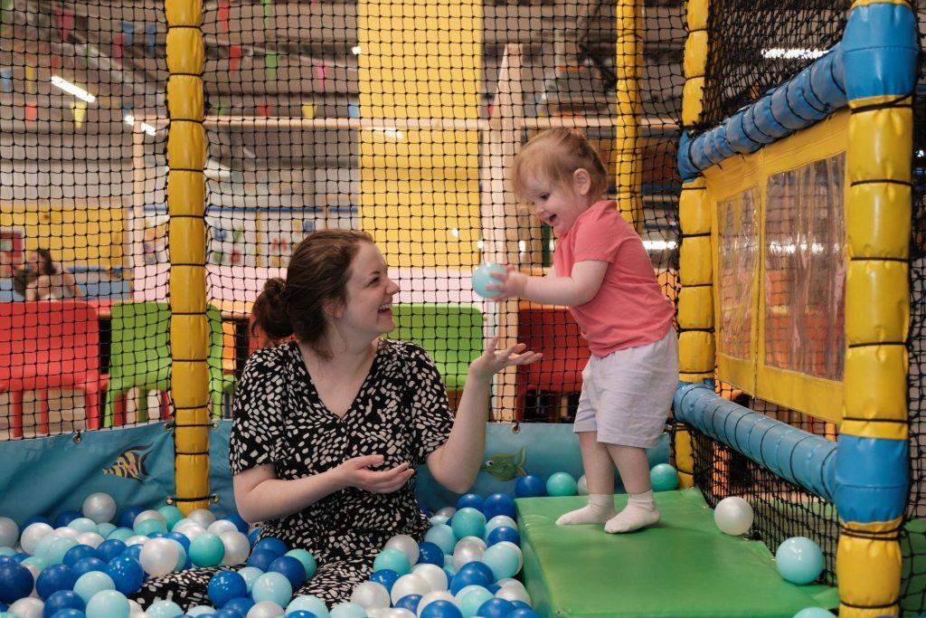 Four children in an inflatable castle. Four children in an inflatable castle.