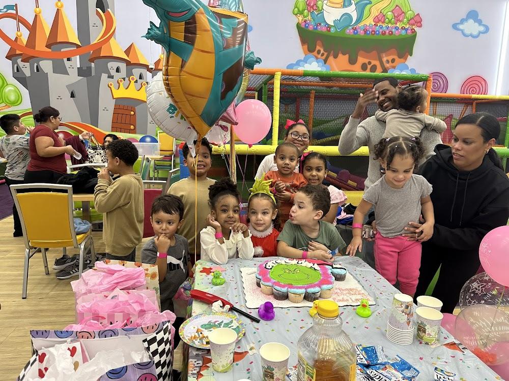 Four children in an inflatable castle. Four children in an inflatable castle.