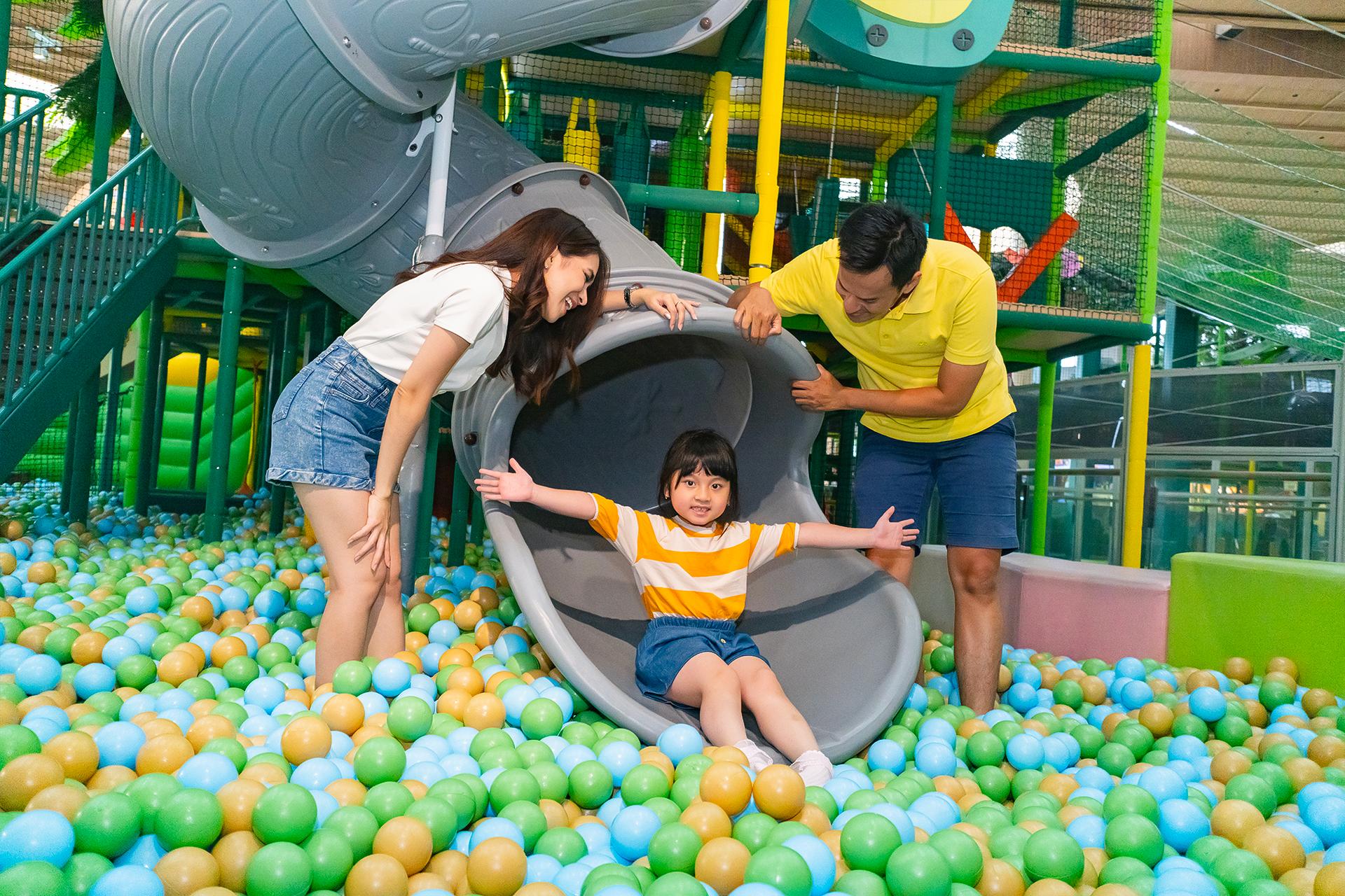 Four children in an inflatable castle. 